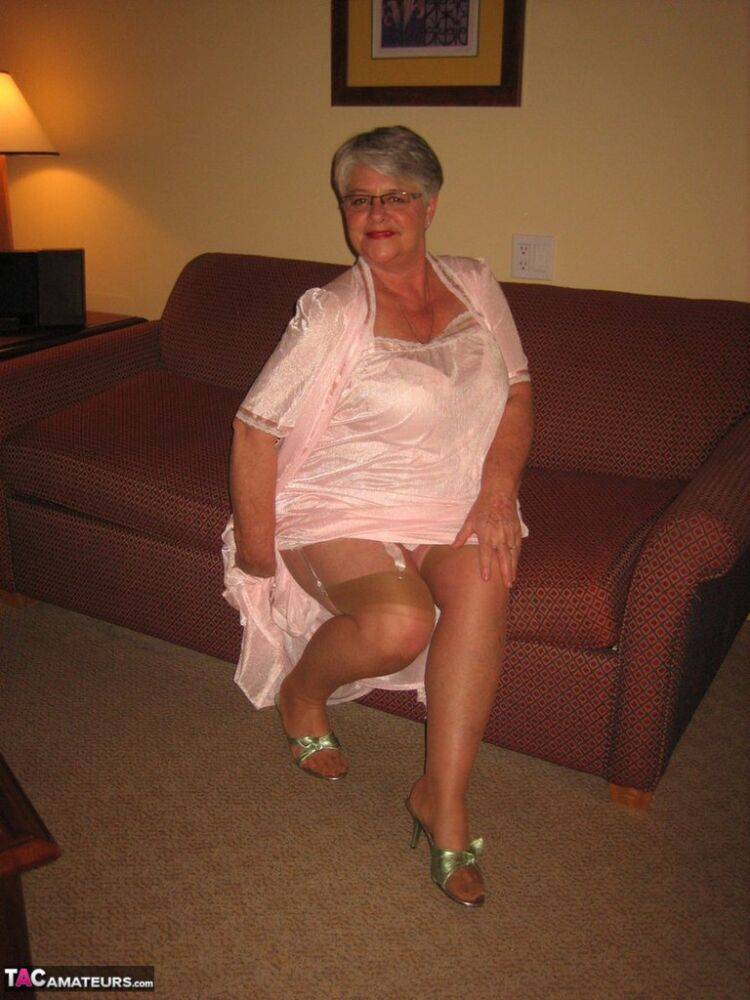 Amateur granny on the heavy side shows her pussy in lingerie and tan nylons - #16