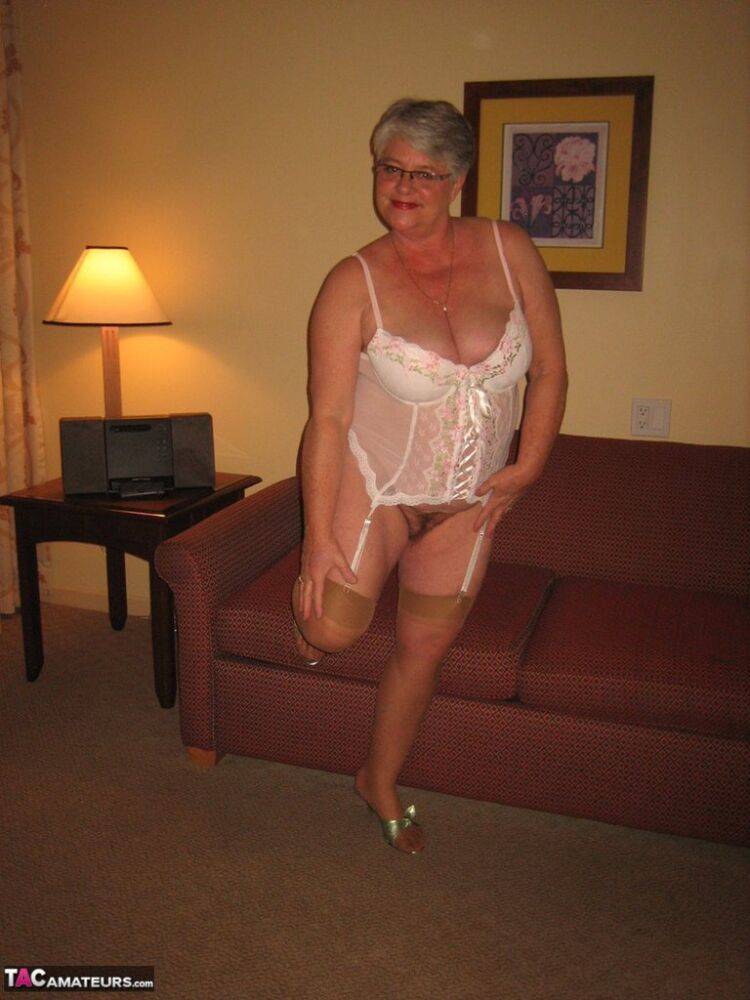 Amateur granny on the heavy side shows her pussy in lingerie and tan nylons - #1