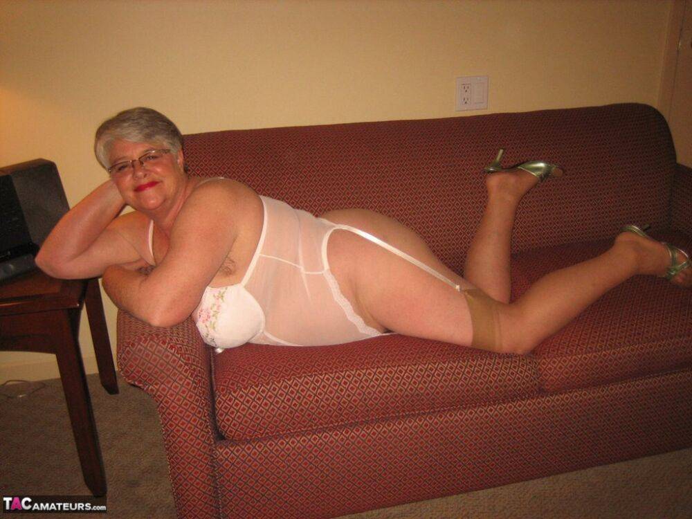 Amateur granny on the heavy side shows her pussy in lingerie and tan nylons - #2