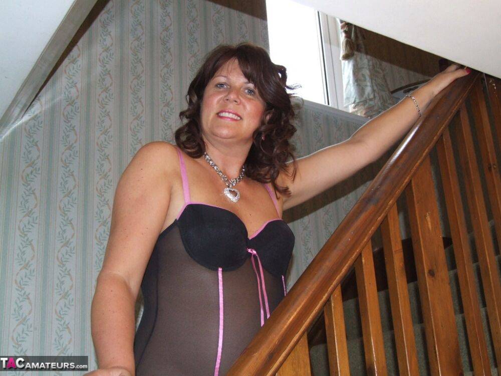 Busty horny housewife Sandy in sheer lingerie spreading pussy on the stairs - #4