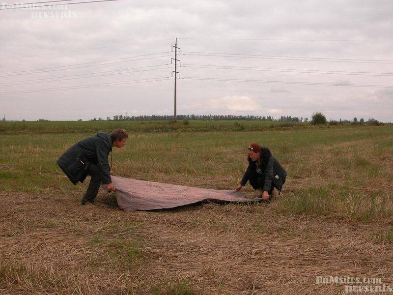 Older redhead fucks a homeless man on a blanket in a field - #1