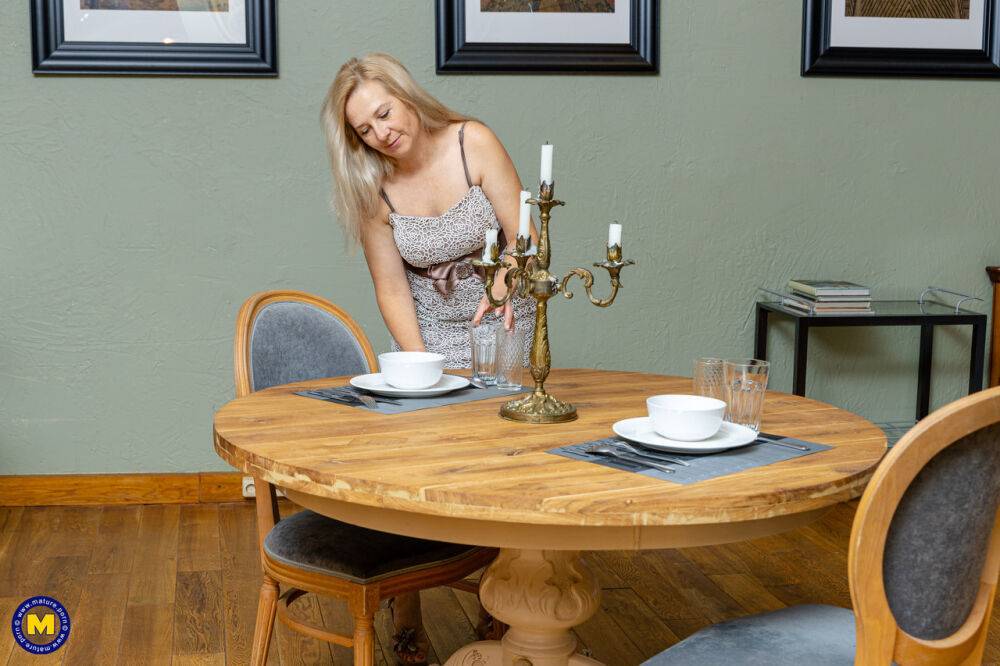 Older blonde sets the dining table before masturbating in high heels - #2