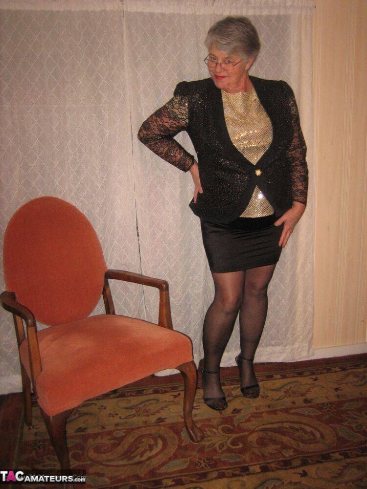 Old woman Girdle Goddess strips down to her hosiery before masturbating - #12