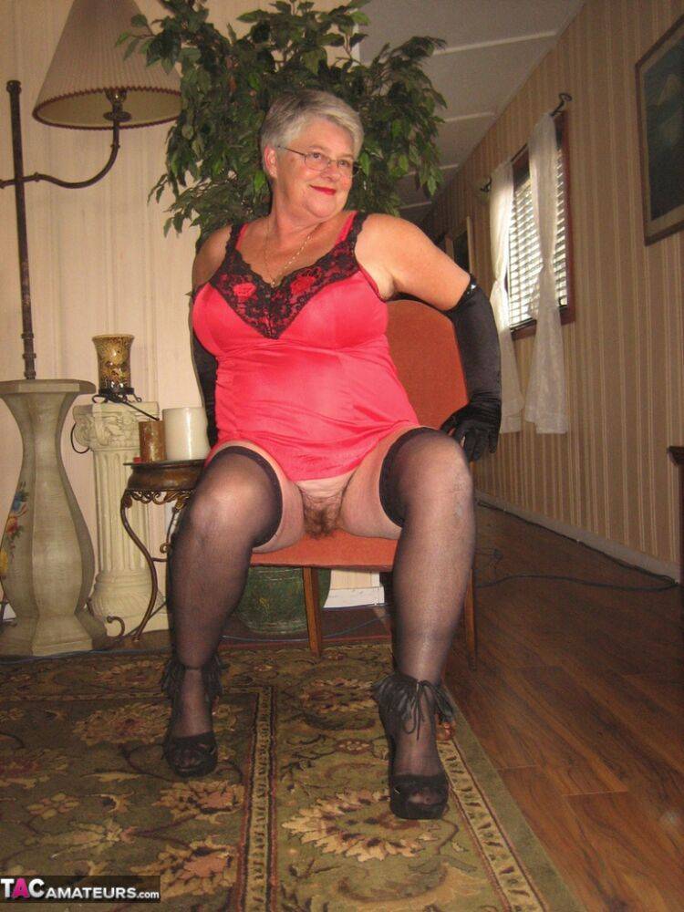 Old lady Girdle Goddess casts off lingerie to pose nude in hosiery and gloves - #7