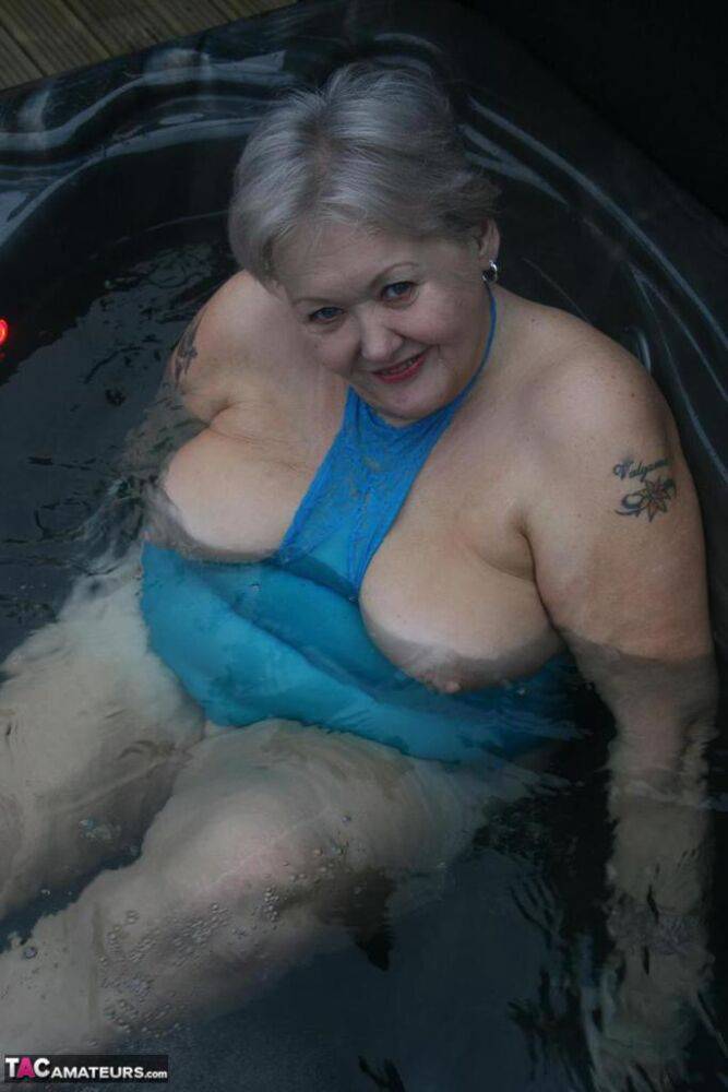 Chubby nan Valgasmic Exposed shows her tits and pussy in an outdoor hot tub - #11