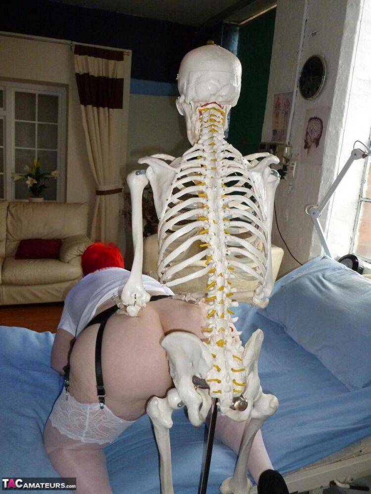 Older redhead nurse Valgasmic Exposed gets banged by a dildo wielding skeleton - #4