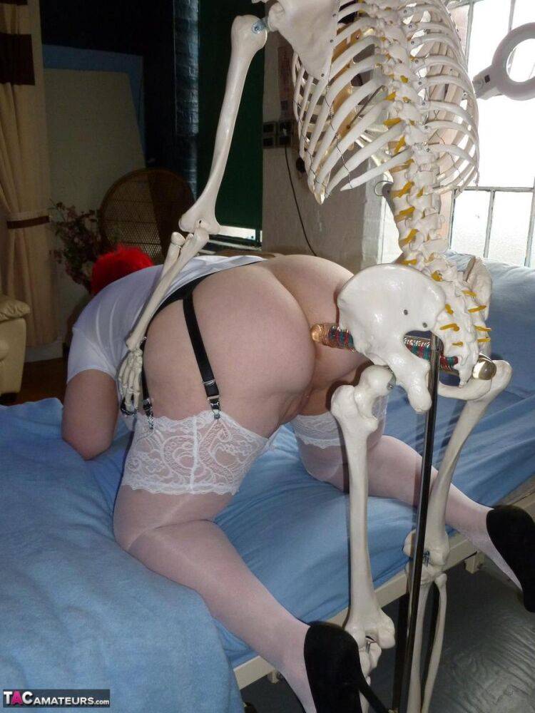 Older redhead nurse Valgasmic Exposed gets banged by a dildo wielding skeleton - #8