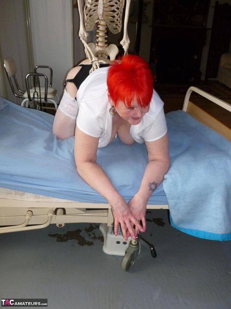 Older redhead nurse Valgasmic Exposed gets banged by a dildo wielding skeleton - #7