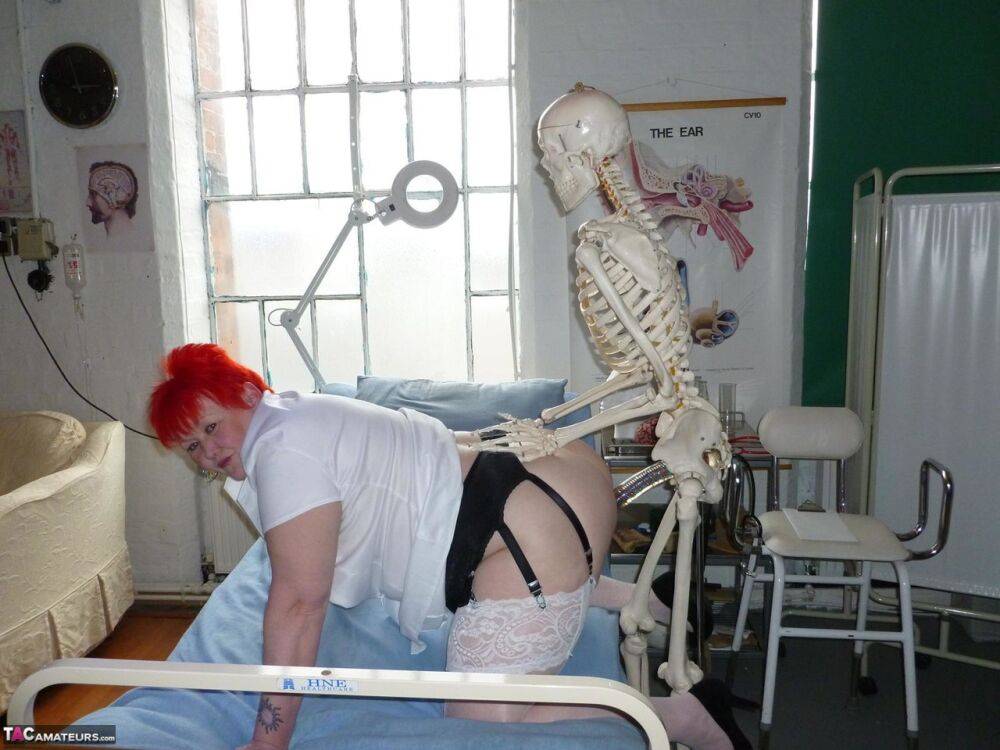 Older redhead nurse Valgasmic Exposed gets banged by a dildo wielding skeleton - #1