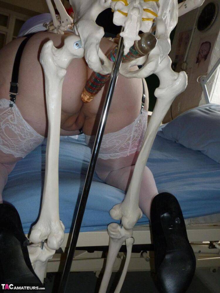 Older redhead nurse Valgasmic Exposed gets banged by a dildo wielding skeleton - #16