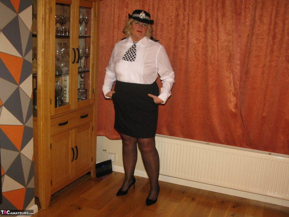 Mature policewoman Chrissy Uk looses her tits and twat from her uniform - #6