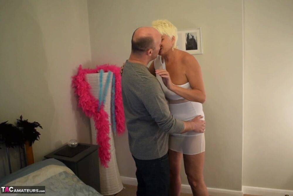 Older blonde and her gentleman friend get naked before commencing 69 sex - #12