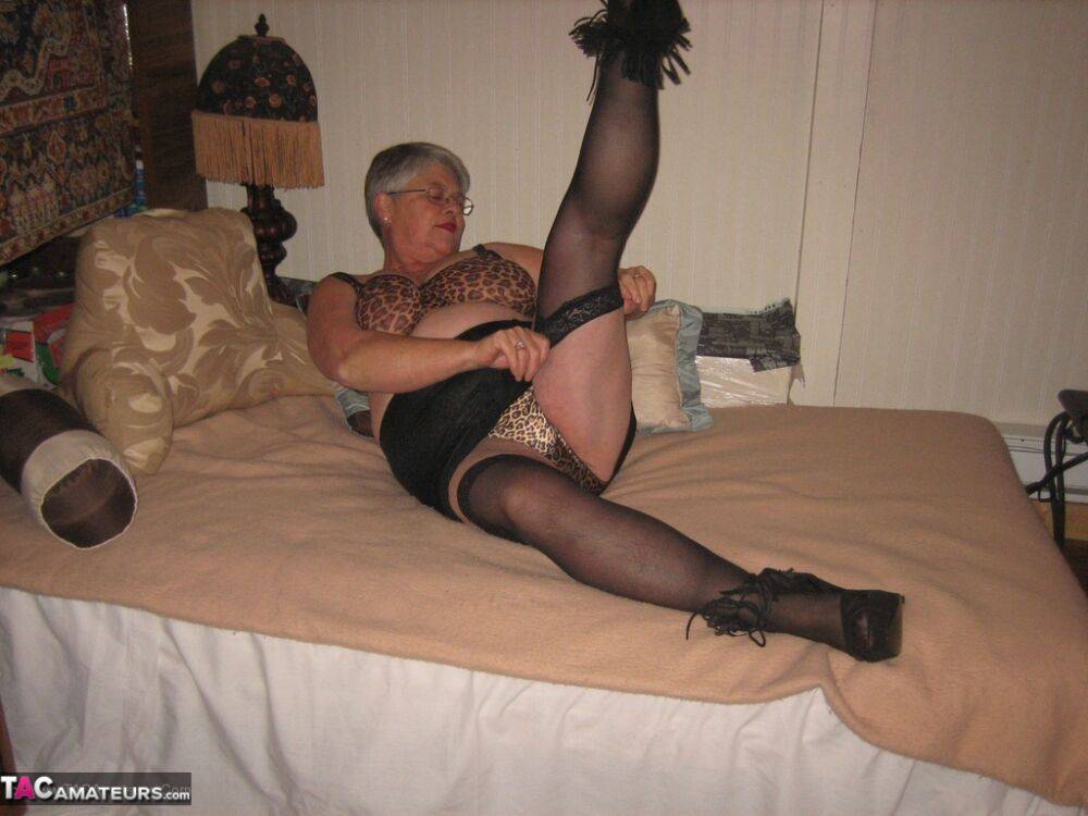 Silver haired granny Girdle Goddess masturbates on her bed in stockings - #15