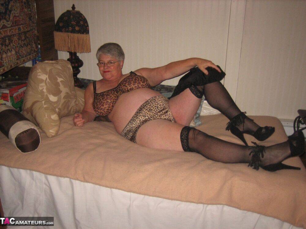 Silver haired granny Girdle Goddess masturbates on her bed in stockings - #16