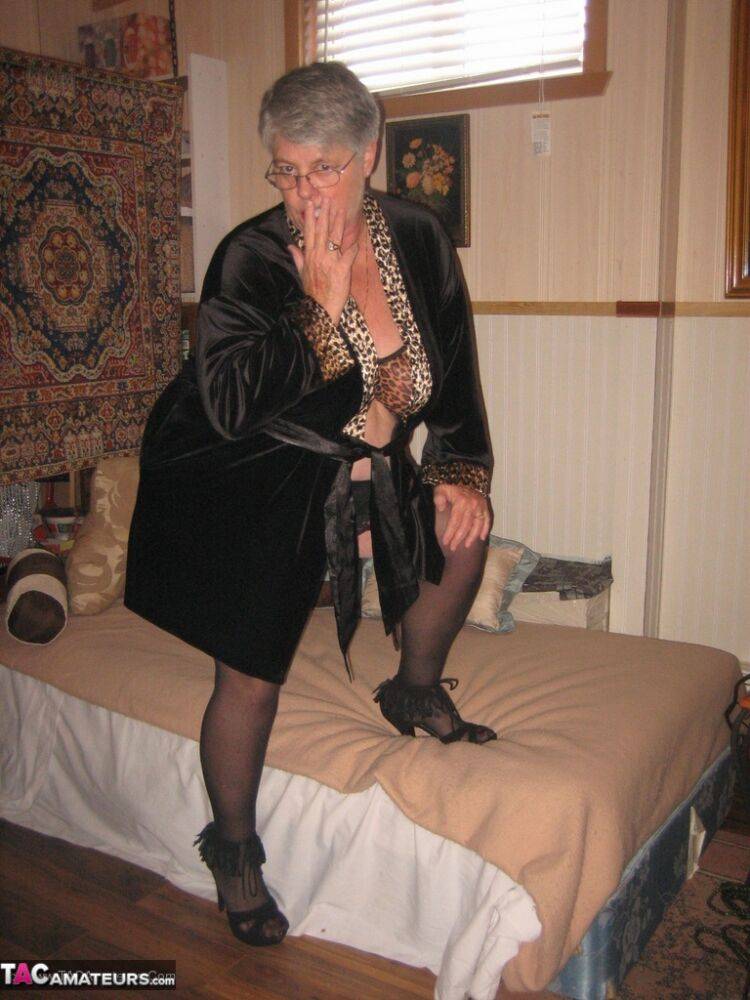 Silver haired granny Girdle Goddess masturbates on her bed in stockings - #11