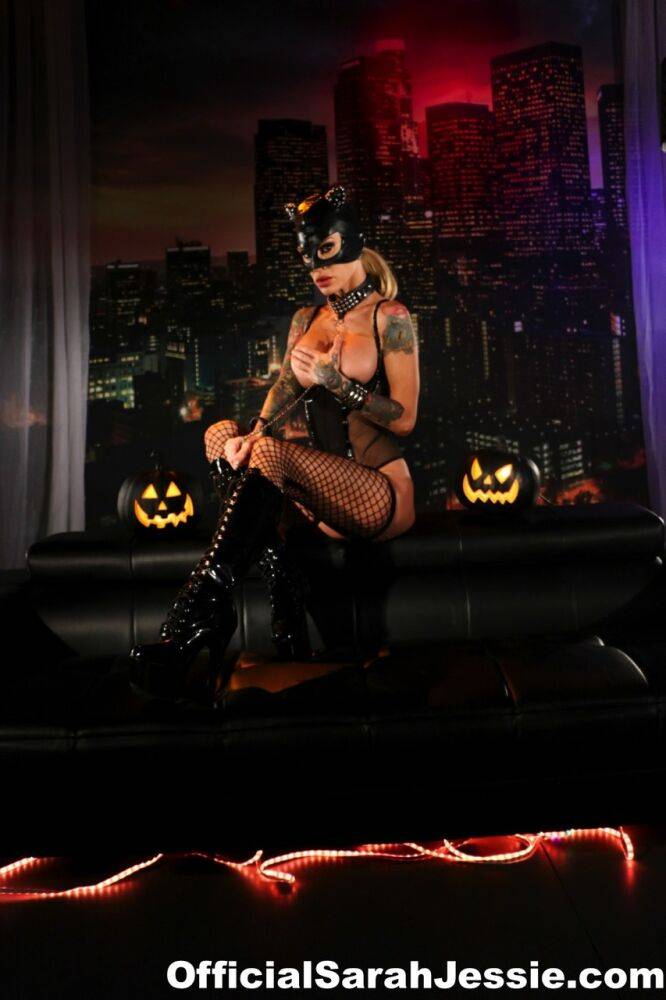 Tattooed chick Sarah Jessie exposes her tits and twat in a Catwoman mask - #1