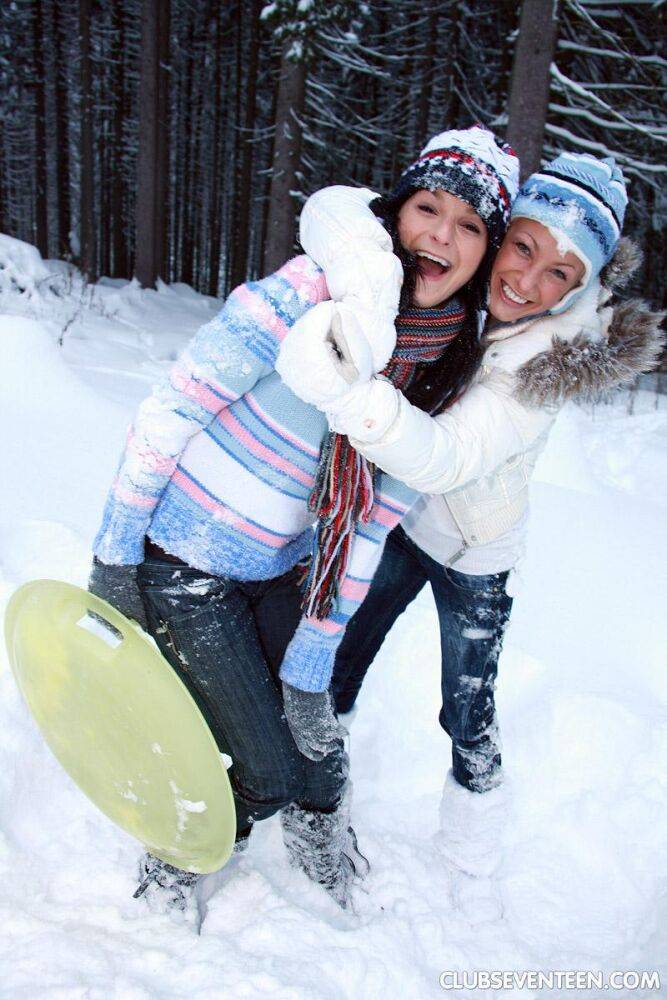 Young lesbians Ella & Christine toy pussies on snow covered ground - #2