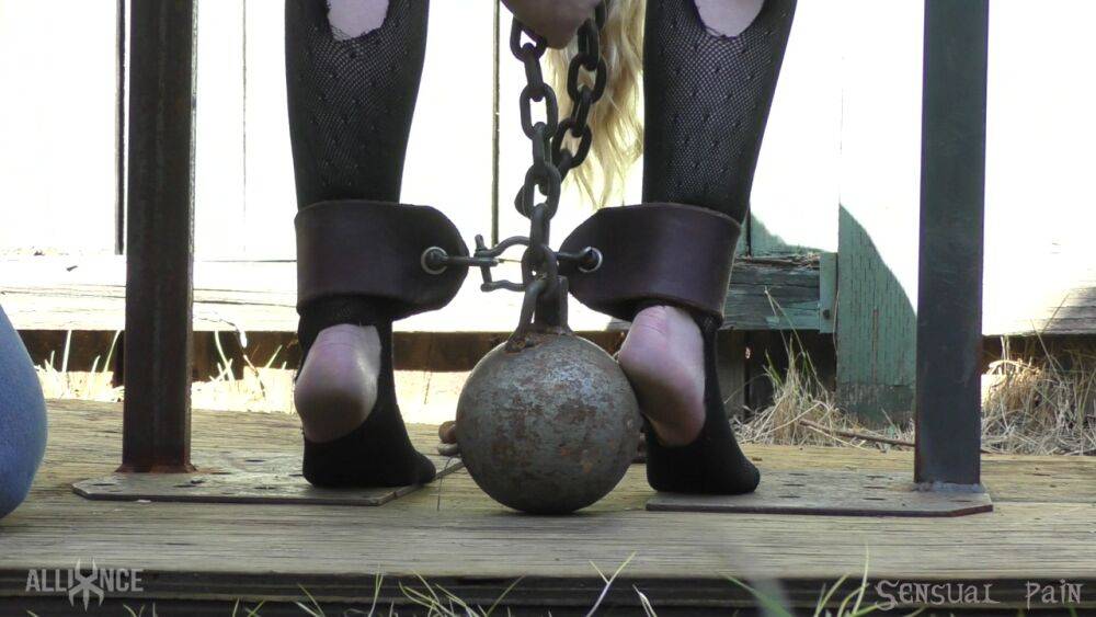 Blonde slave Jessica Kay chained on the porch for painful BDSM ass whipping - #11