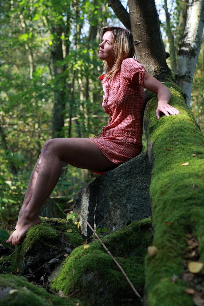 Young girl and her boyfriend have sex on moss covered boulders in a forest - #6