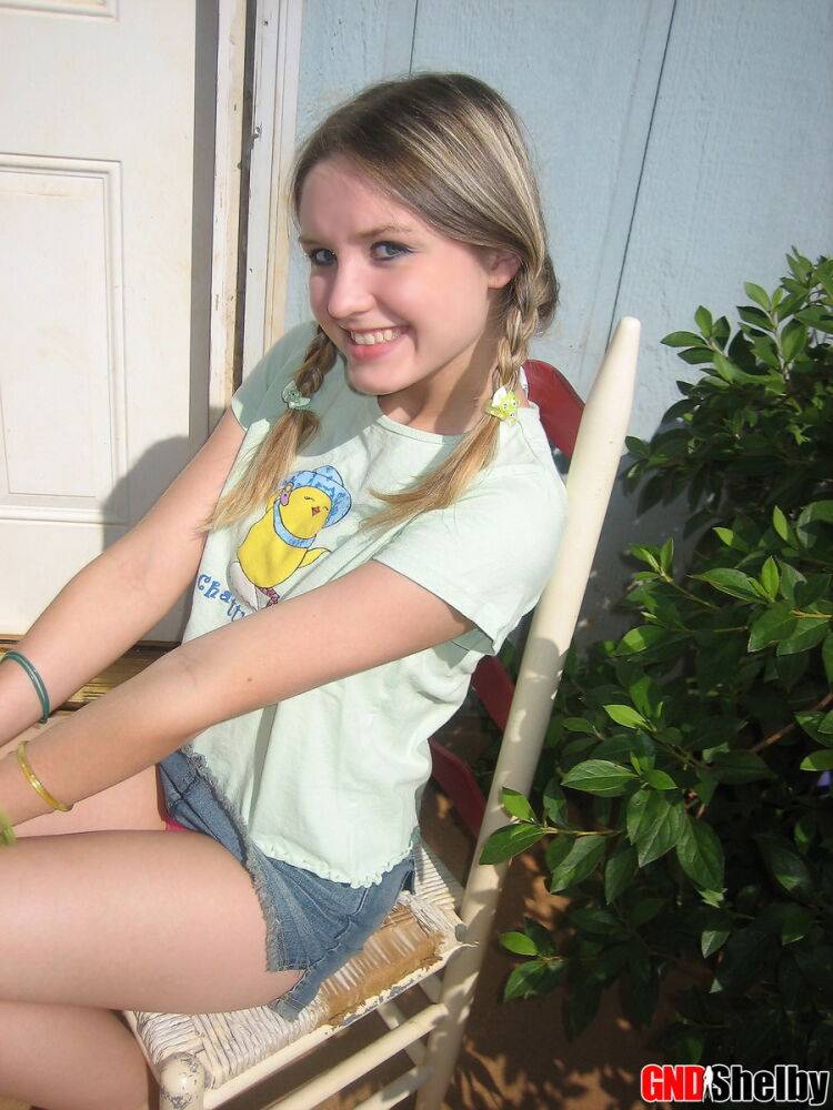 Cute teenage babe Shelby takes a smoke break and flashes us her perky tits - #9