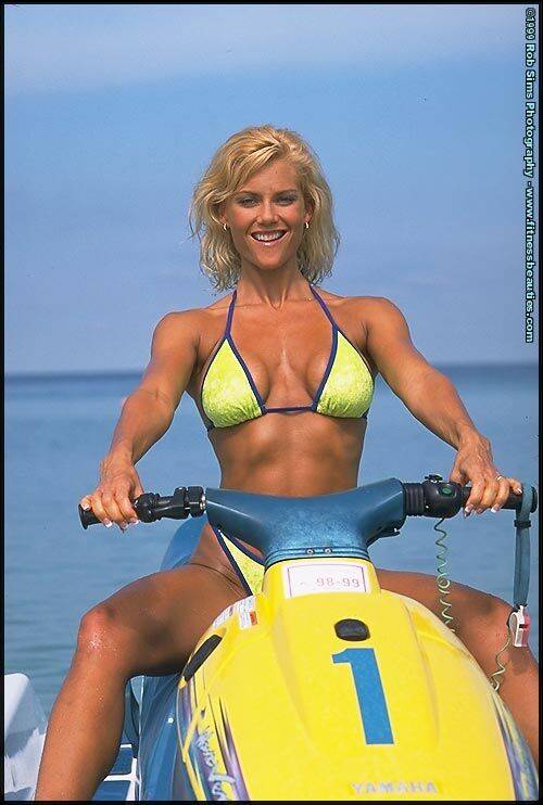 Blonde fitness model Stephanie Metzdorf flexes in a bikini on a jet ski - #8