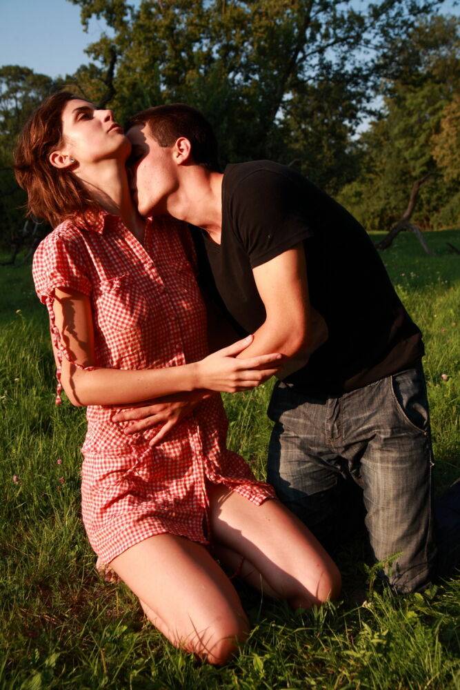 Young couple have sexual intercourse in a grassy field near a gnarly tree - #3