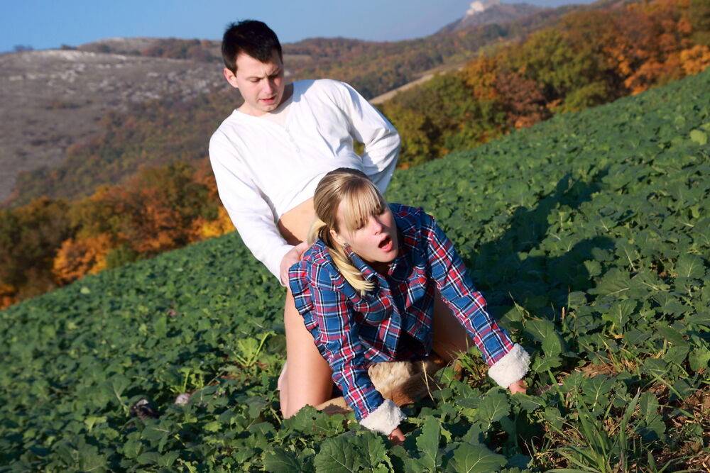 Young blonde and her boyfriend have sex in the middle of a field of crops - #2