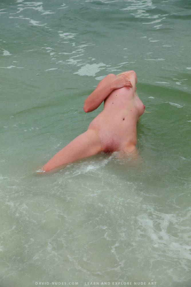 Frolicking naked in the ocean - #4