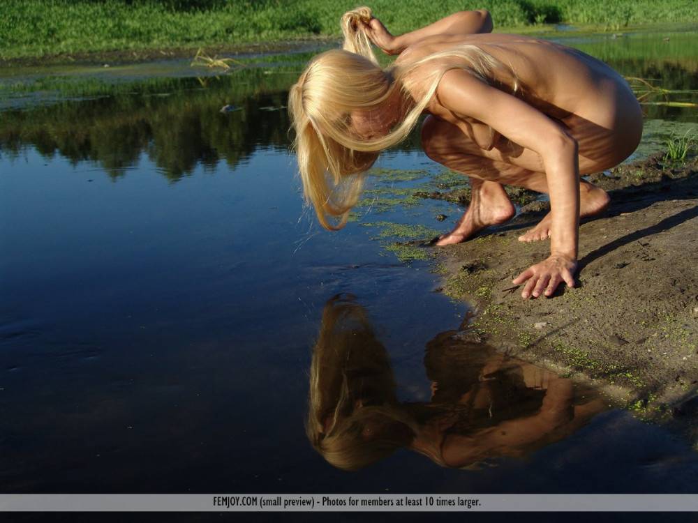 Blonde With Luxurious Hair Desire A Poses Nude Outdoor And Admires Her Own Body Reflected In Water - #12