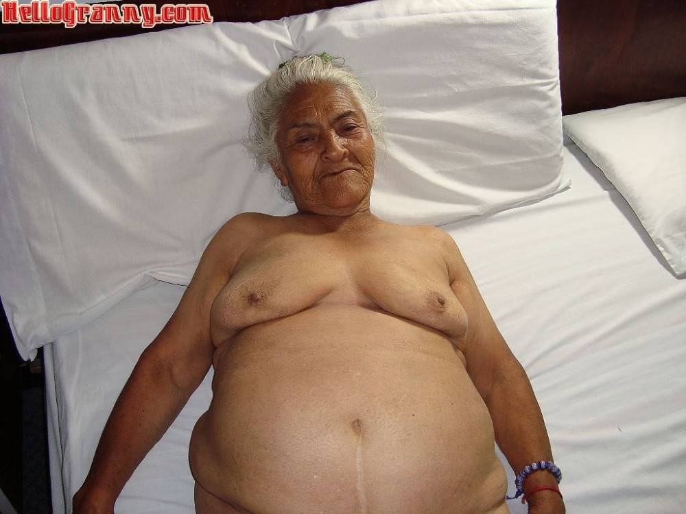 Granny in chair shows her pussy and big tits - #14