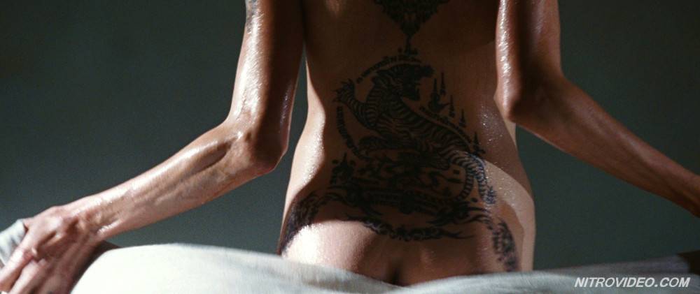 Angelina jolie exposing her hot tattooed body - #4