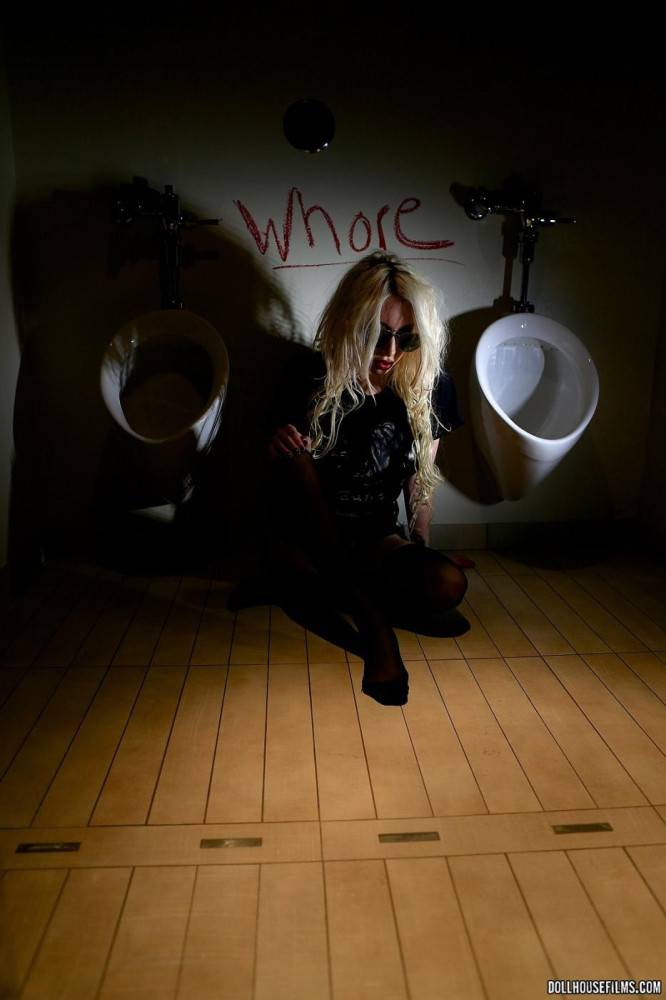 Long Legs Blonde Valerie Fox Shows Her Rebellious Side By Posing In The Men's Bathroom. | Photo: 5330321