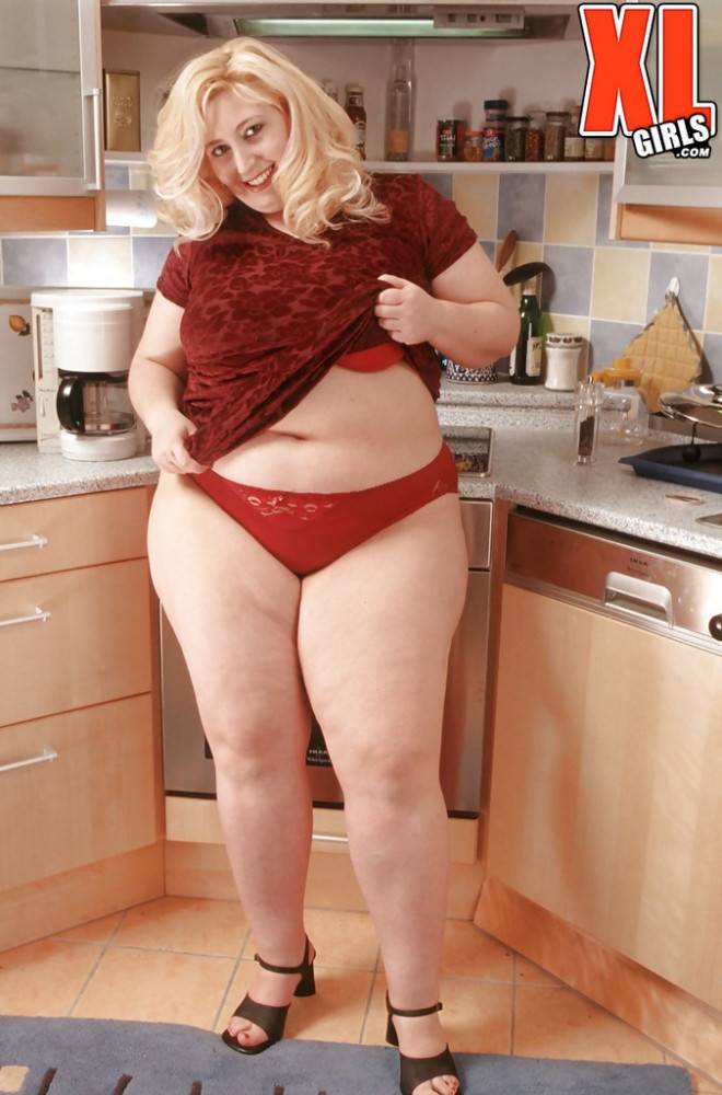 Appealing blond ssbbw Radka show some foot fetish in the kitchen - #1