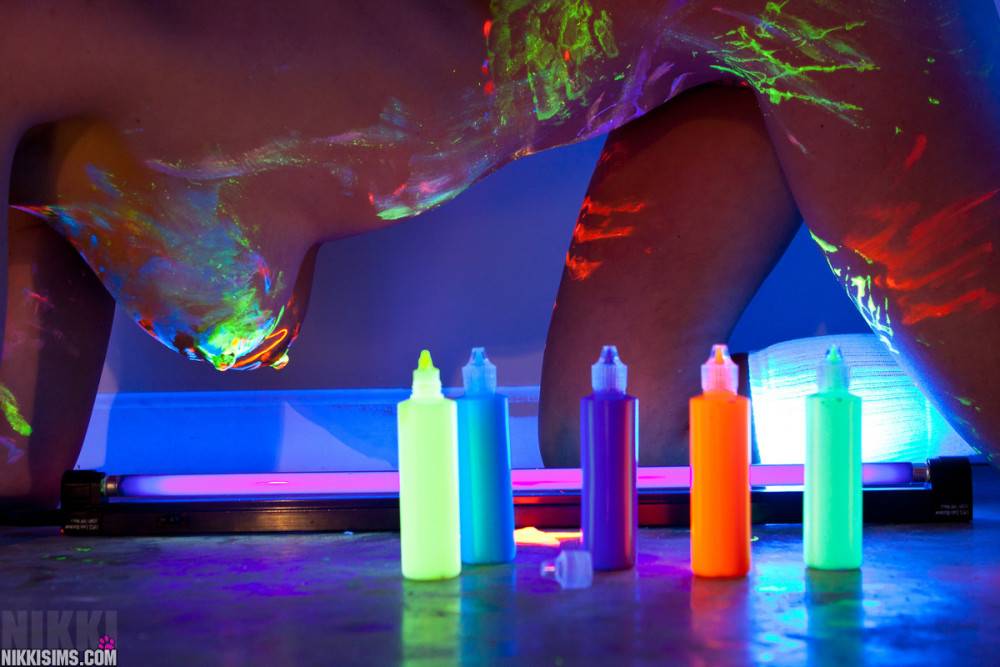 Nasty Babe Nikki Sims Plays With Some Neon Colors Under The UV Light And Poses Naked - #7
