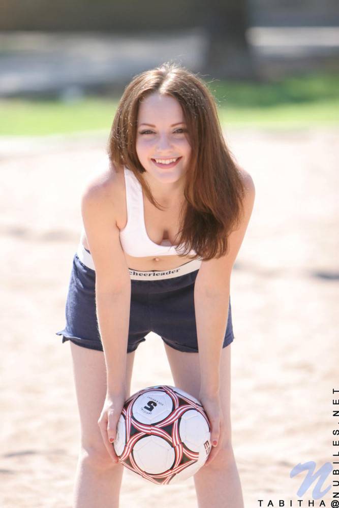 Smiling Sportive Girl Tabitha Nubiles In Snow White Top And Blue Shorts Poses With A Ball Outside - #7