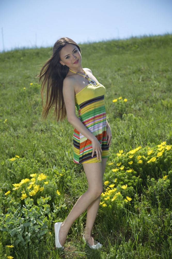 Slender asian dark-haired teen Li Moon in nice skirt likes foot fetish outdoor - #21