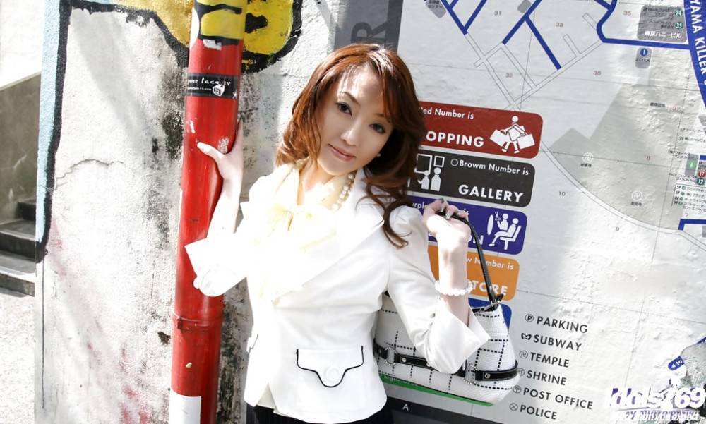 Svelte japanese teen Fumiko in fancy skirt work on rod - #2