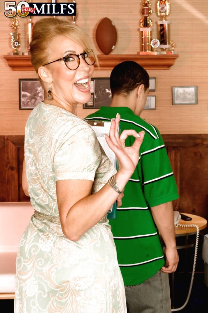 Sexy american blond mommy Erica Lauren in sexy glasses shows big hooters and spreads her legs - #3