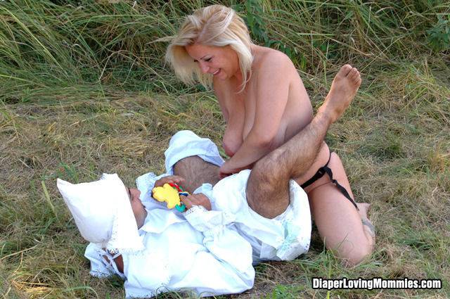 Adult baby jerked off by blond on grass - #4