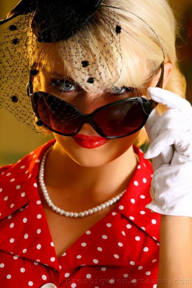 Glamorous Blonde Danni With Retro Hair Style Removes Her Polka Dot Red Dress | Photo: 7374395