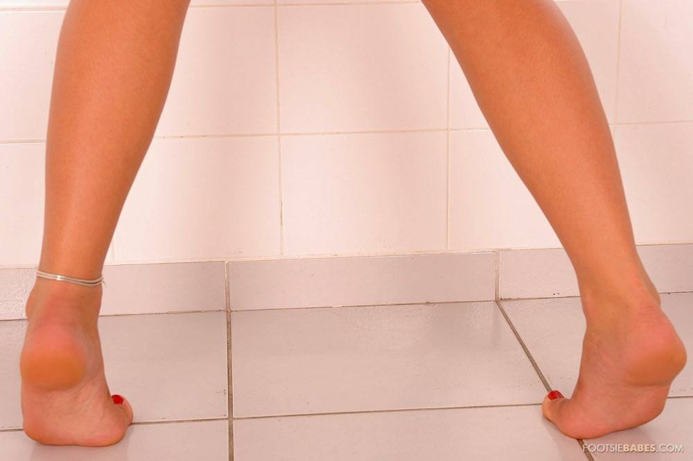 Long Legged Temptress Becky Stevens Strips Off Her Miniskirt And Holds Dildo With Her Feet - #7