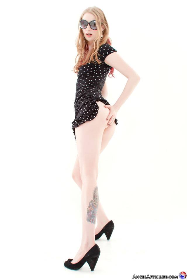 Pale Skinned Tattooed Blonde Ela Darling Strips Her Black Dress In Polka Dots And Poses | Photo: 8733198