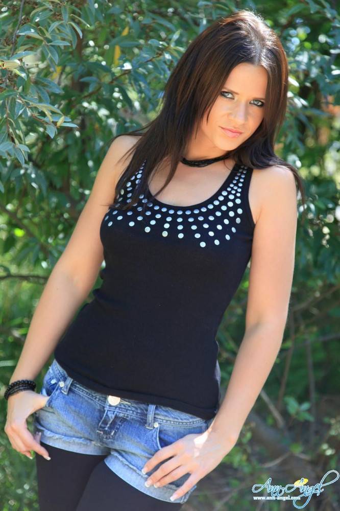 Alluring Brunette Ann Angel In Ultra Stylish Black Denim Shorts Poses In Nature - #11