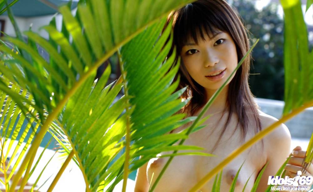 Tempting japanese babe Hikari Hino revealing big boobies and ass near the pool - #14