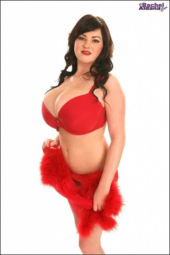 Appealing latin brunette milf Rachel Aldana exposing big tits and undressing - #1