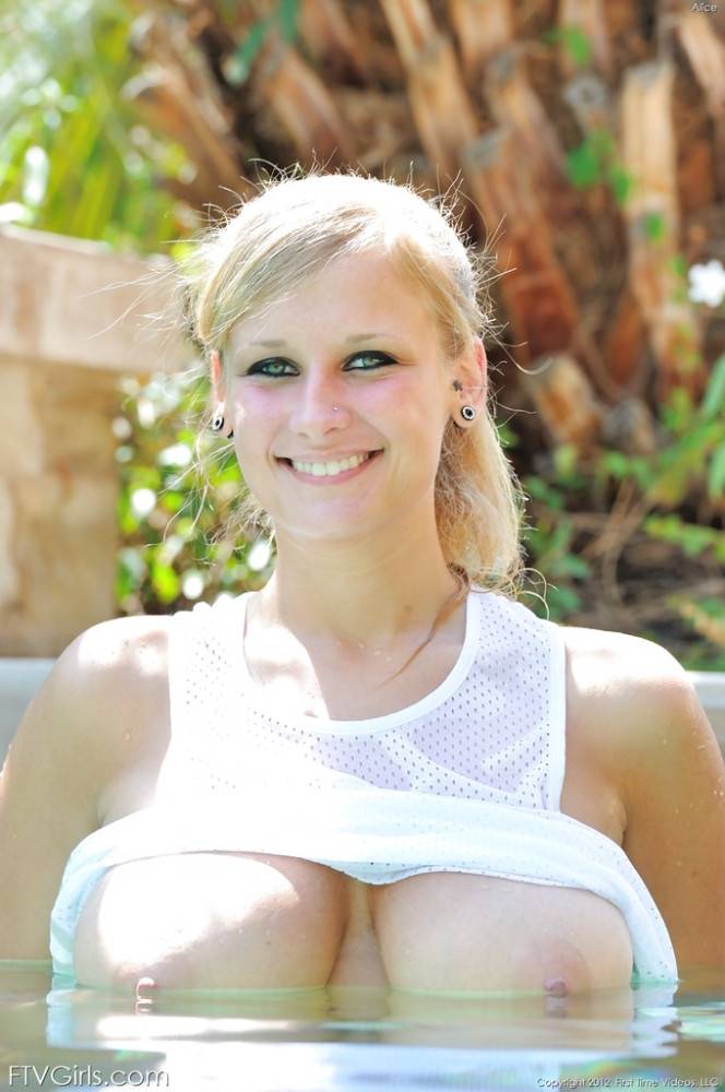 Lovely american blond Alice Wonder revealing big titties and shaved pussy near the pool - #11
