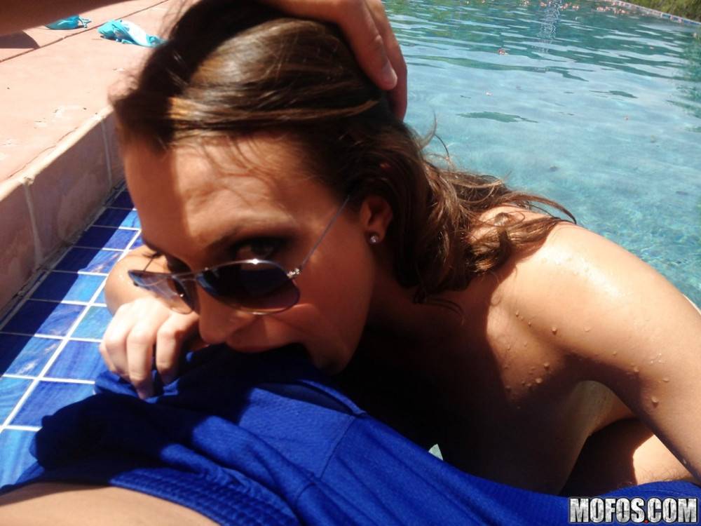 Very attractive american teen Lily Love in glasses take in mouth rod near the pool - #8