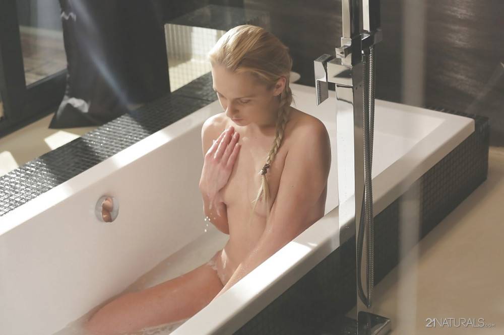 Inviting ukrainian blond porn star Ivana Sugar revealing big tits and jerking off in bathroom | Photo: 8375476