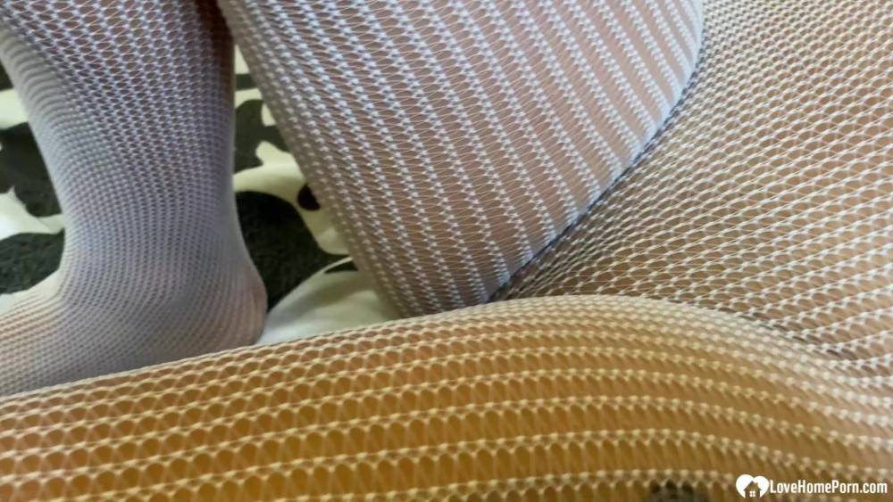 Brunette in a fishnet playing with her slit - #9