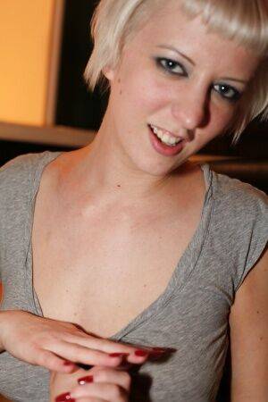 Short-haired blonde Cherry Torn revealing her big tits and shaved slit on nudesceleb.com